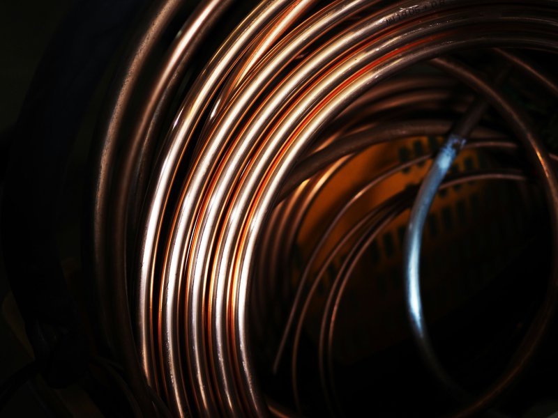 Coiled copper refrigerant line set bundled before installation