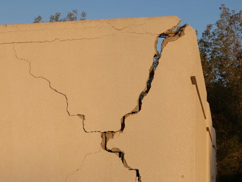 Vertical crack running the height of a concrete foundation wall